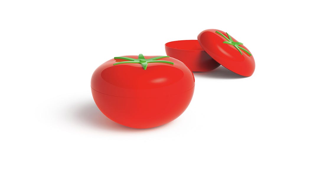 Un bol avec couvercle en forme de tomate